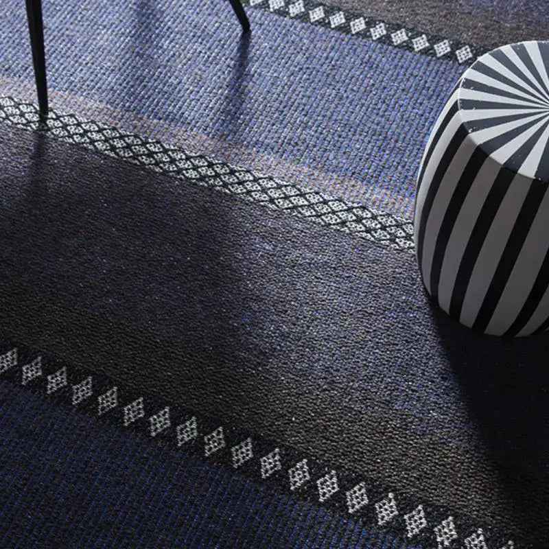 Forest cobalt rug in blue black and gray with stripes and pattern